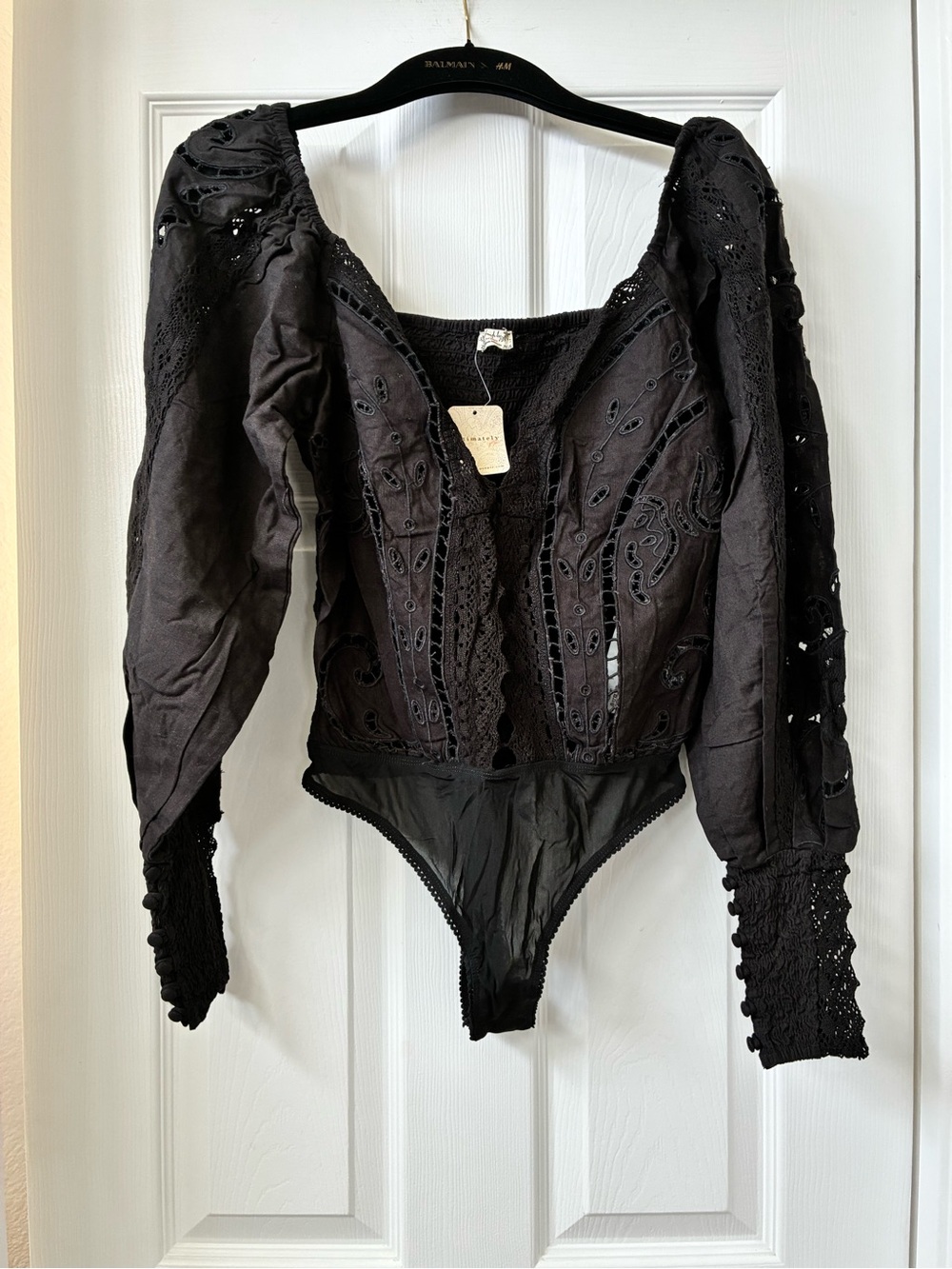Free People “Regina Bodysuit” Black Eyelet Lace Puff-Sleeve Bodysuit